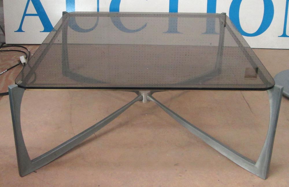 COFFEE TABLE, French 1970s, the square glass top on a metal base, 82cm x 82cm x 38cm.