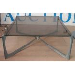 COFFEE TABLE, French 1970s, the square glass top on a metal base, 82cm x 82cm x 38cm.