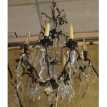 CHANDELIER, en suite with previous lot, patinated metal with six lighting arms,
