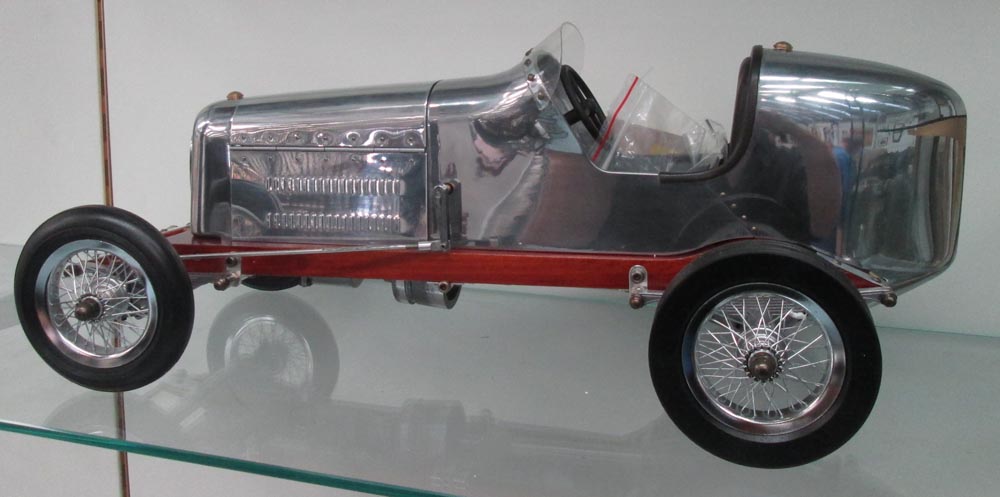 RACING CAR MODEL, 1930s style in polished aluminium finish, 50cm L.