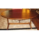 VENDAGE TABLE, 19th century French painted pine and fruitwood with oval tilt top,