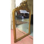 WALL MIRROR, Napoleon III giltwood and gesso with urn, flower decoration and arched bevelled plate,