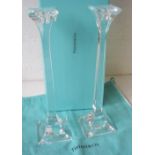 TIFFANY GLASS CANDLESTICKS, a pair, 25.5cm H, new and unused, original packaging.