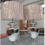 TABLE LAMPS, a pair, urn shaped with chromed finish on lucite base with shades, 80cm H.