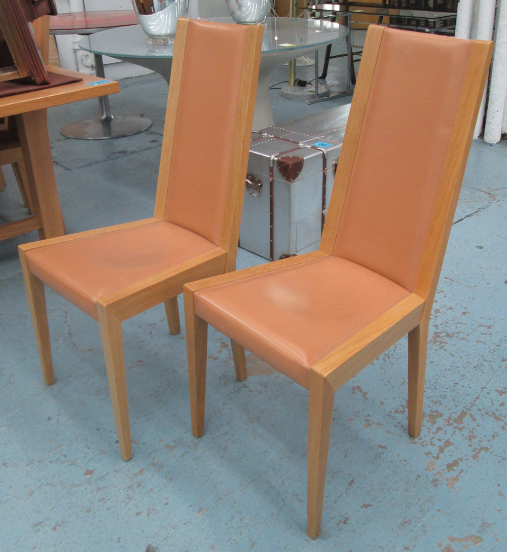 DINING CHAIRS, a set of eight, by Potocco, oak with leather seat and back on square supports, 45cm.