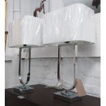 TABLE LAMPS, a pair, Art Deco style, in chromed metal with shades, 75cm H.