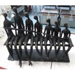 FAMILY FIGURES, seated in bronzed resin on base, 40cm L.