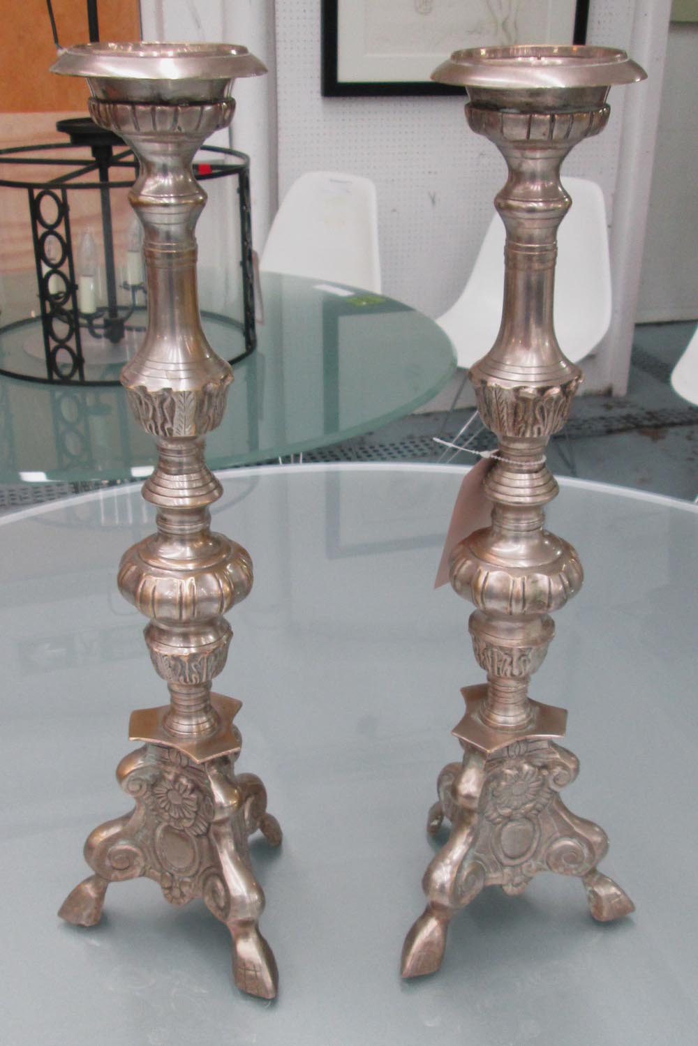 CANDLESTICKS, a pair, Continental style, plated metal, 57cm H.