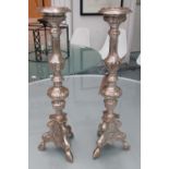 CANDLESTICKS, a pair, Continental style, plated metal, 57cm H.