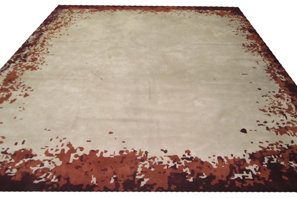 CONTEMPORARY CARPET, by Stepevi in cream on a rustic ground, 420cm x 370cm.