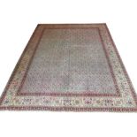 VERY FINE TABRIZ CARPET, 383cm x 300cm, in herati 'Mahi' within ruby bands and jade border.