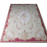 AUBUSSON STYLE NEEDLEWORK CARPET, 274cm x 183cm, of ivory cartouche medallion with floral spray,