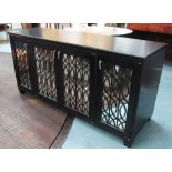 SIDE CABINET, black with four mirrored doors behind metal fretwork, 56cm D x 164cm L x 82cm H.