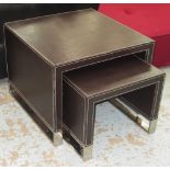 NEST OF TWO TABLES, stitched dark leather covered on chrome supports,