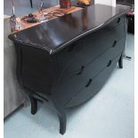 COMMODE, Continental style, ebonised with four long drawers below, 145cm x 83cm H x 45cm.