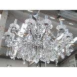 CHANDELIER, twelve branch in a chromed frame with cut glass drops, 80cm W.