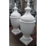 URNS, a pair, blanc de chine crackle glazed with covers, 83cm H x 23cm W.