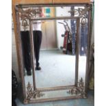 WALL MIRRORS, a pair, Louis XV style, rectangular bevelled in silver painted frames, 120cm x 90cm.