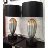 SIDE LAMPS, a pair, having silvered shaped bases with black shades, 86cm H overall.