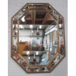 MIRROR, octagonal with a bevelled plate in a mirrored frame, 86cm x 66cm.