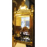 WALL MIRROR, 19th century style with decorative gilt frame, marginal plates and arched crest,