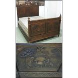 BED, late 19th/early 20th century French ash with figure carved head and footboards,