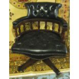 DESK CHAIR, mahogany with swivel seat in worn buttoned black leather, 63cm W.