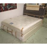 DOUBLE BED, 6ft W with a brown buttoned headboard and a cream mattress.