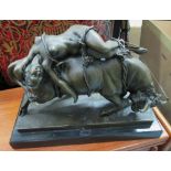 GIRL LYING ON A BULL, in bronzed finish on a marble base, 44cm L.