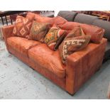 SOFA, with tan leather upholstery and loose kelim fronted scatter cushions, 211cm L.