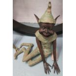 BRONZE, of a seated goblin, 54cm H.