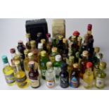 40 VARIOUS SPIRIT AND LIQUEUR MINIATURES - DOW`S PORT TIN SET, BAILEYS, GORDON`S GIN, CAPTAIN MORGAN