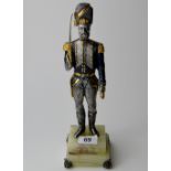 10½" 800 GRADE SILVER & 22 CARAT GOLD COLD PAINTED STATUE IN THE FORM ON A NAPOLEONIC SOLDIER FROM