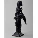 11" BRONZE STATUETTE OF A YOUNG GIRL PERCHED UPON ON A COLUMNED PEDESTAL