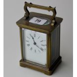 5½" HEAVY BRASS CARRIAGE CLOCK WITH WHITE ENAMEL FACE & BLACK ROMAN NUMERAL HOUR MARKERS WITH KEY