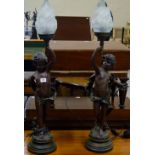 PAIR OF 35" BRONZED CHERUB LAMPS WITH FLAME GLASS SHADES