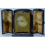 ZENITH BRASS CASED 8 DAY TRAVEL ALARM CLOCK WITH FITTED LEATHER CASE