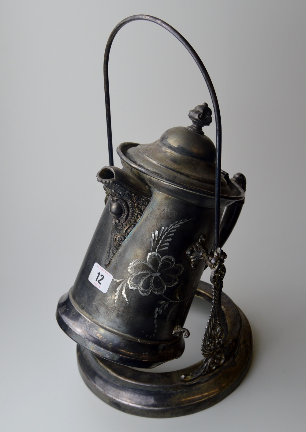 LARGE WHITE METAL HOT WATER POT WITH ORNATE HANDLE & SPOUT ON PIVOT STAND MARKED W.R 700