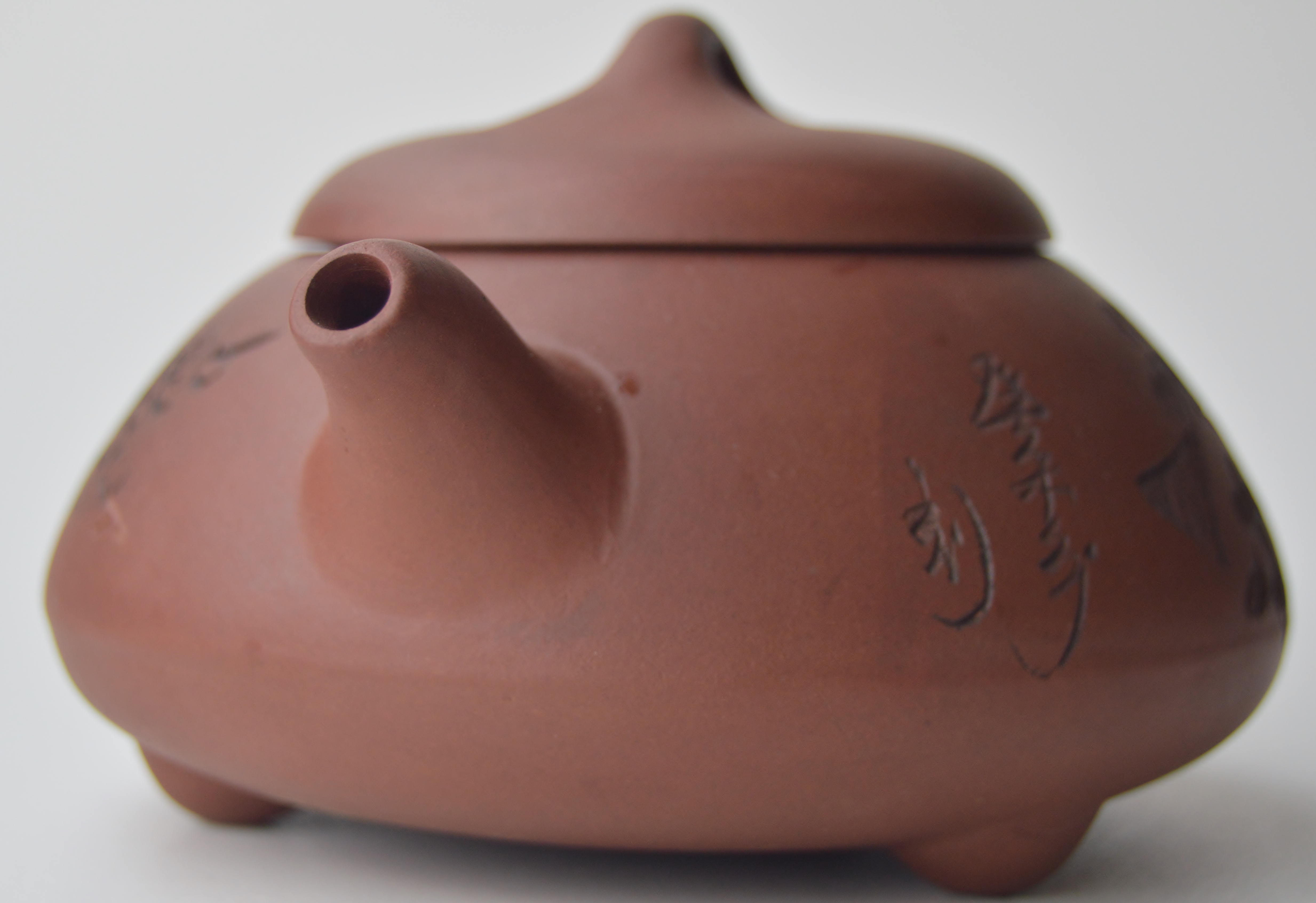 CHINESE YIXING SQUAT FORM TEAPOT & COVER DECORATED WITH CALLIGRAPHY & PRUNUS WITH IMPRESSED SEAL