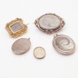 A collection of mourning jewellery to include a late 18th century silhouette signed Meirs, male head