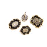 A collection of mourning jewellery to include a group of three 19th century memorial plaque brooches