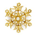 A pearl set brooch of open floral design, set throughout with graduated seed and half pearls, set in