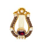 A late 19th century gold, pearl and gem set brooch modelled as a lyre, the frame principally of