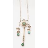 An early 20th century seed pearl and turquoise set necklace the fine link chain with central panel