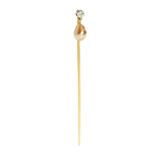 A natural pearl and diamond set stick pin the claw set small diamond with suspended natural pearl of