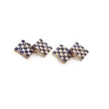 A pair of sapphire set cufflinks the square terminals of chequered design, each set throughout