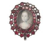 An early 19th century miniaturemodelled in unmarked white metal as a jewellery clasp, the oval