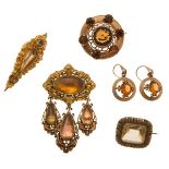 A Scottish citrine set brooch and associated earringsall of circular outline and set throughout with