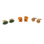 Three pairs of gentleman's cufflinksto include a pair of gilt metal cufflinks, each set with green