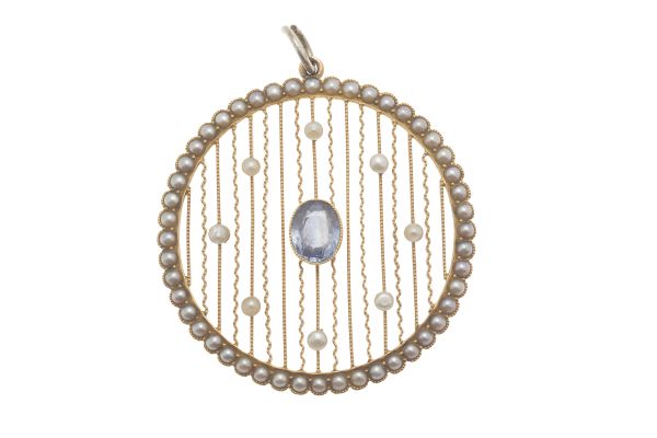 A Belle Epoque pearl and sapphire set pendantof pierced circular design, set throughout with small